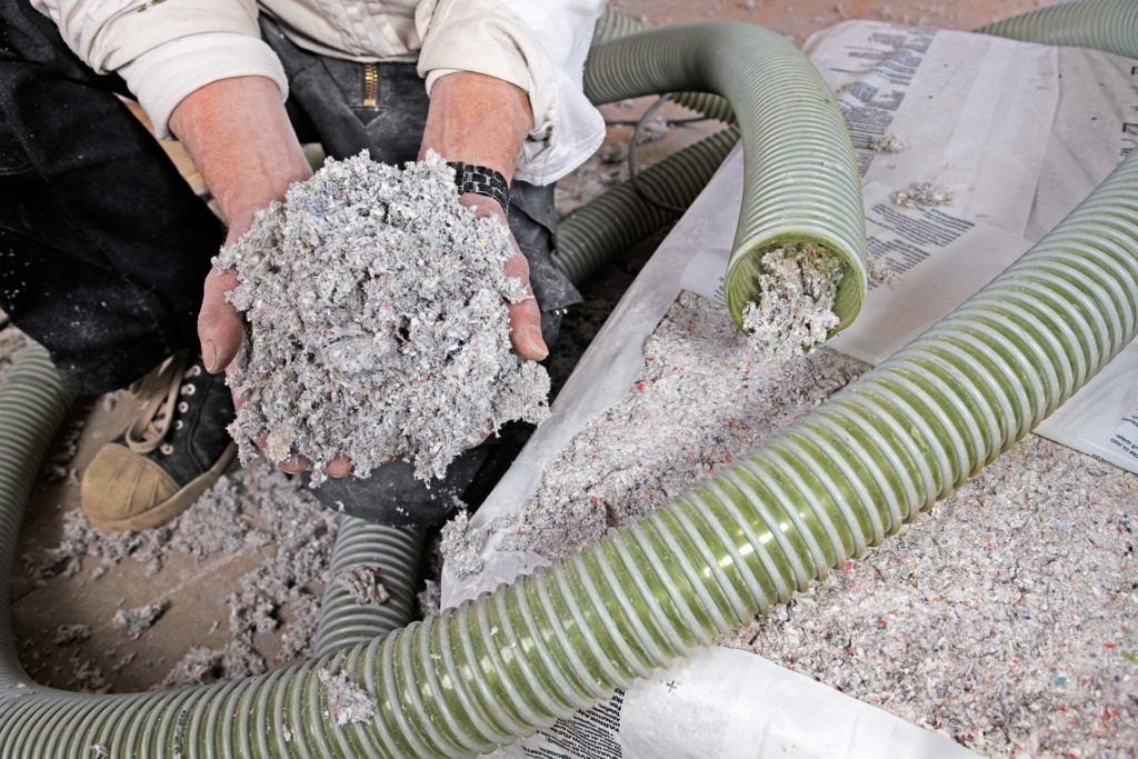 Man holding insulation
