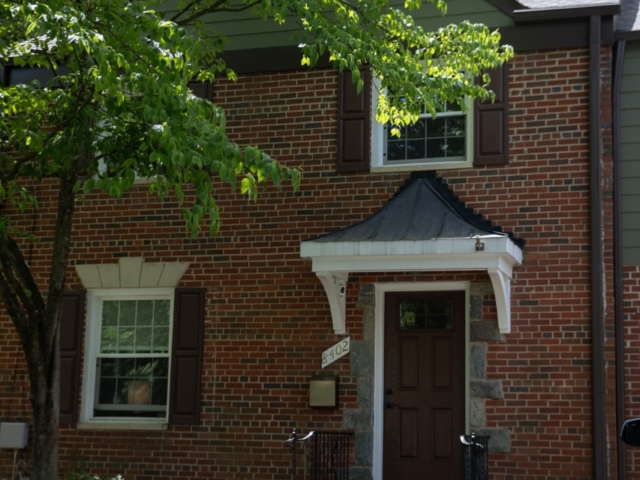 1970's Bethesda home has new roof, siding, and doors installed