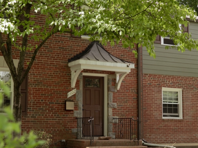 1970's Bethesda home has new roof, siding, and doors installed